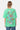 T-shirt Jwin Vert oversize porté de dos par une mannequin femme, inscription In the end l'amour win, jean bleu