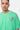 T-shirt Jwin Vert porté par un mannequin homme avec chaîne, gros plan de face sur l'inscription L'amour win multicolore