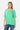 T-shirt Jwin Vert oversize porté de face par une mannequin femme, petit L'amour win coloré sur la poitrine, jean bleu