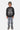 Sweat col rond Firdaws Noir Délavé porté par un enfant, grand écusson smiley Eleven Paris imprimé, avec jean à fleurs de lys