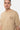 T-shirt Lys Beige porté par un mannequin homme, gros plan sur l'inscription marron Maison Elevenparis factory 2003