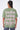 T-shirt Lys Kaki délavé, gros plan du dos porté par une femme avec grande inscription rose Another Fucking Bonjour Madame