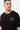 T-shirt Lys Noir Strass porté par un mannequin homme avec chaîne fine, zoom sur l'inscription Maison Elevenparis en strass