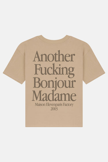 T-shirt Lys Beige à plat, vue de dos avec inscription marron Another Fucking Bonjour Madame 2003
