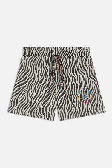 Short Maestro Zèbre à plat, vue de face avec imprimé zèbre noir et blanc, cordons tressés et broderie colorée
