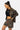 Sweat à capuche zippé Moon Léopard avec short assorti, porté par une femme de profil, broderie pyramide colorée
