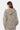Sweat à capuche Moon Bandana Kaki vu de dos, porté par une femme, imprimé cachemire sur fond kaki