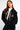 Sweat à capuche zippé Moon Noir porté par une mannequin femme, cordons colorés et broderie pyramide sur la poitrine