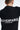 T-shirt Naava Noir vu de dos, gros plan sur l'inscription ElevenParis On Earth Since 2003 en lettres blanches