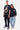T-shirt Pharell Noir Délavé porté par un mannequin homme, imprimé graphique coloré de félin, mannequin femme à ses côtés