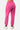 Jogging Paradis Rose délavé vu de dos sur une mannequin femme, taille élastiquée, bas resserré, baskets roses et blanches