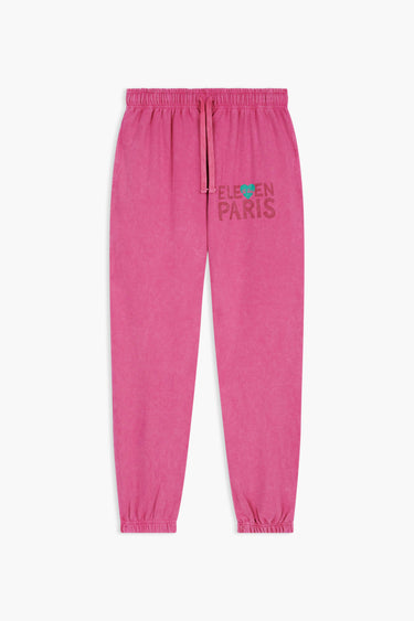 Jogging Paradis Rose vif à plat, vue de face, cordon de serrage, bas élastiqué, logo ELEVEN PARIS à carré turquoise