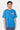 T-shirt Parma Bleu porté par un mannequin homme, vue de face, coeur rose souriant sur la poitrine, coupe ample