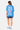 T-shirt Parma Bleu vu de dos sur une mannequin femme en short bleu marine, imprimé More amour por favor