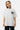 T-shirt Parma Gris délavé porté par une mannequin femme, coeur noir souriant sur la poitrine, coupe ample