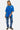 T-shirt Peams Bleu délavé porté par une mannequin femme en jean bleu, vue de face en pied, baskets noires
