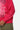 Sweat Fepito Rose fuchsia, zoom sur la manche avec petits coeurs blancs imprimés et bord côtelé, pantalon kaki