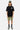 Short cargo Piranha Kaki porté par un mannequin homme avec t-shirt noir et casquette verte, vue de face en pied