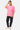 T-shirt Portofino Rose porté en pied par un mannequin femme, de face, cœurs sur la poitrine, jean noir et baskets