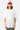 T-shirt Portofino Blanc porté par un mannequin homme avec casquette rose, de face, trois cœurs colorés sur la poitrine
