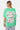 T-shirt Portofino Vert porté par un mannequin femme, de dos, grand cœur blanc et inscriptions Love Amor, jean clair