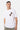 T-shirt Punky Blanc porté par un mannequin homme, de face, deux fleurs de lys brodées à motif léopard, pantalon kaki