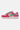 Baskets District V6 Rose de profil, daim rose et fuchsia, motif fleur verte, lacets verts et blancs