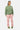 Pantalon cargo Suede Rose porté en pied par une mannequin femme avec sweat vert kaki et baskets vertes