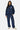Veste zippée Taren Bleu Marine portée en pied par une mannequin femme avec pantalon de survêtement assorti