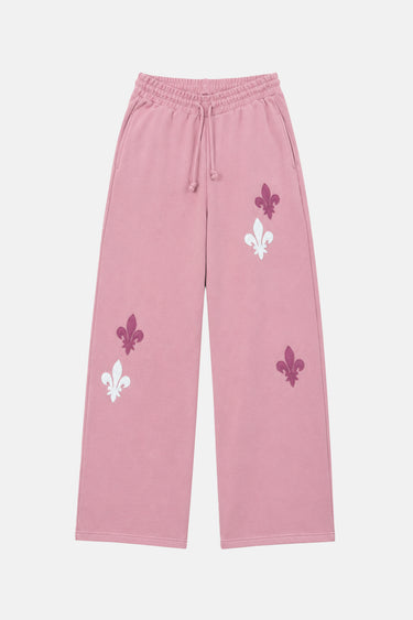 Jogging Tilman Rose à plat de face, jambe large, cordon et fleurs de lys violettes et blanches