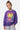 Sweat col rond Titi Violet porté de face par une fille, coeur jaune souriant et inscription Eleven Paris