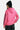 Sweat à capuche Toscana Rose porté de dos par une mannequin avec bonnet noir, inscriptions gothiques noires sur les manches