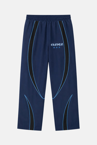 Pantalon de survêtement Tunis Bleu Marine de face à plat, bandes noires et liserés bleu clair, inscription Eleven
