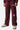Jogging Tura Cherry bordeaux porté de face en plan rapproché par un enfant, fleurs brodées et inscription Eleven Paris