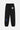 Jogging Tutti Noir vu de dos à plat, une fleur de lys blanche en haut et une bleue en bas de jambe