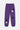 Jogging Tutti Violet de face à plat sur fond blanc, quatre fleurs de lys noires et blanches et bas élastiqués