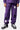 Jogging Tutti Violet porté de face en plan rapproché par un enfant, fleurs de lys noires et blanches et baskets
