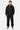 Jogging Tulum Noir en look complet porté par un mannequin homme avec sweat zippé noir assorti et baskets grises