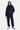 Jogging Tulum Bleu Marine en look complet porté par une mannequin femme avec casquette, sweat zippé assorti et baskets bleues