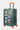 Valise Fugers Vert M de trois quarts, coque vert foncé, patchs colorés, poignée latérale argentée, roulettes orange