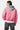 Blouson Eschott Rose porté de dos par une mannequin femme, capuche grise amovible avec inscription et cœur rose