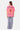 T-shirt Jam Rose vu de dos sur une mannequin femme, tartine en cœur, inscription Eleven et pantalon à carreaux