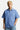 Chemise Jovenis Bleu à rayures portée par un mannequin homme, poche poitrine ornée d'un écusson cœur brodé