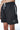 Maillot de bain Nibby Noir de face, cordon blanc et noir, bande zippée blanche et patch coeur brodé blanc