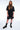 Short Ninon Noir délavé porté par une femme avec t-shirt noir assorti, de face en pied, chaussettes noires