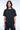 T-shirt Noemie Noir délavé porté par un mannequin homme, vue de face, effet délavé marbré, coupe ample