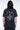 T-shirt Noemie Noir délavé vu de dos, grande fleur de lys gris clair entourée de lettres gothiques