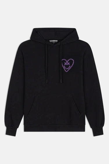 Sweat à capuche Flouze Noir de face à plat, cordons noirs, petit cœur à croix violet sur la poitrine