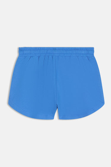 Short Jarny Bleu à plat, vue de dos, taille élastiquée et bas arrondi sans motif