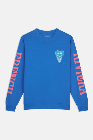Sweat col rond Jim Bleu à plat, vue de face, petit cœur turquoise qui coule, inscriptions roses French Riviera sur manches